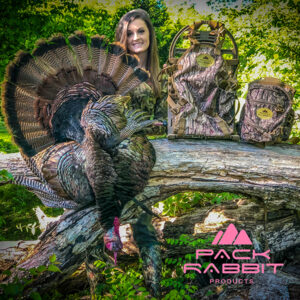 Girl showing off trophy turkey and camouflage chest pack and backpack